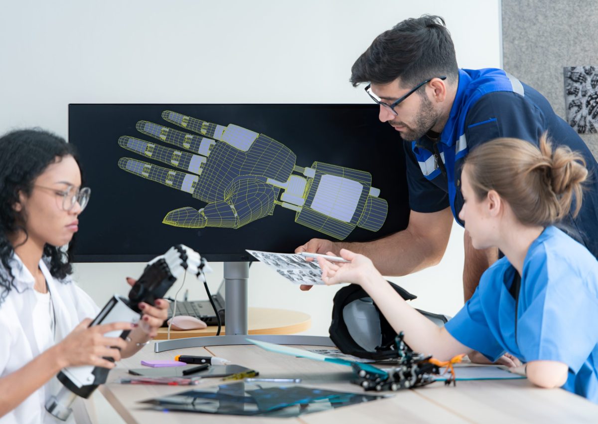 Engineers, doctors and physical therapists brainstorm ideas to design a robot with arm and hand organs, To be utilized for additional testing on patients.
